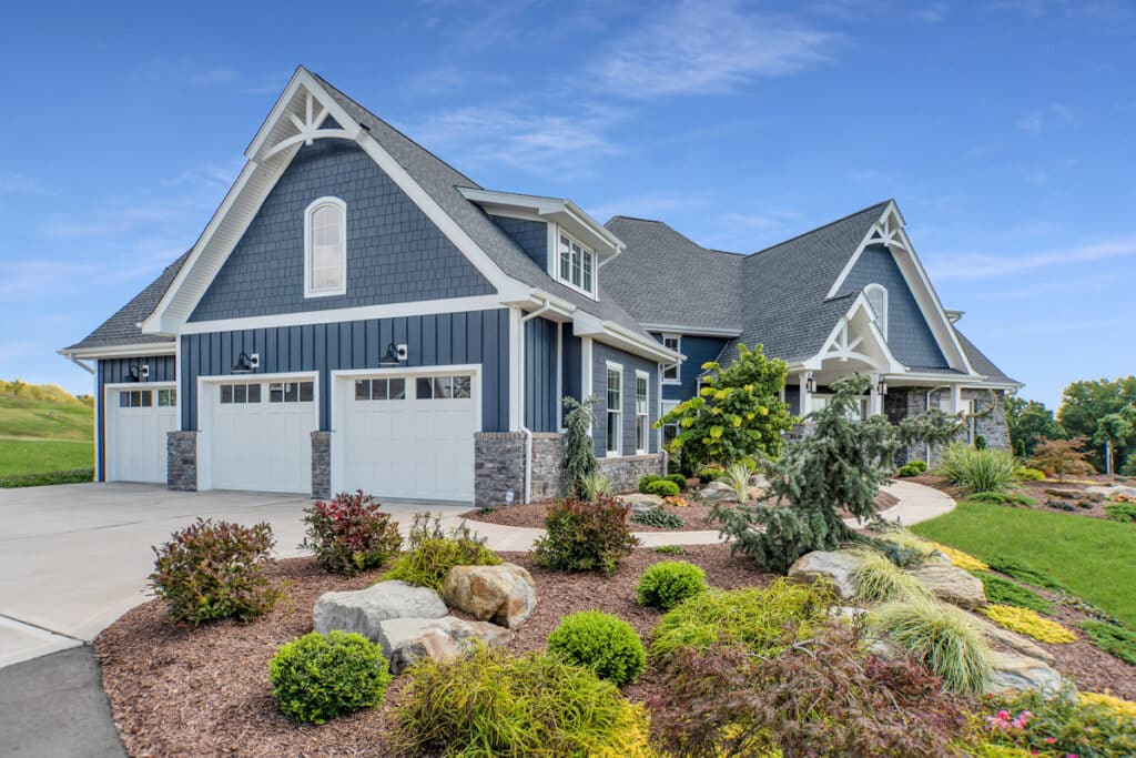 Build on your lot, an example of a blue home built on a lot